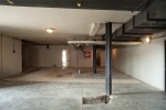 Technical floor (1st floor); cleared spaces and original asphalt insulation in the floor, 2010: photograph: David Židlický
