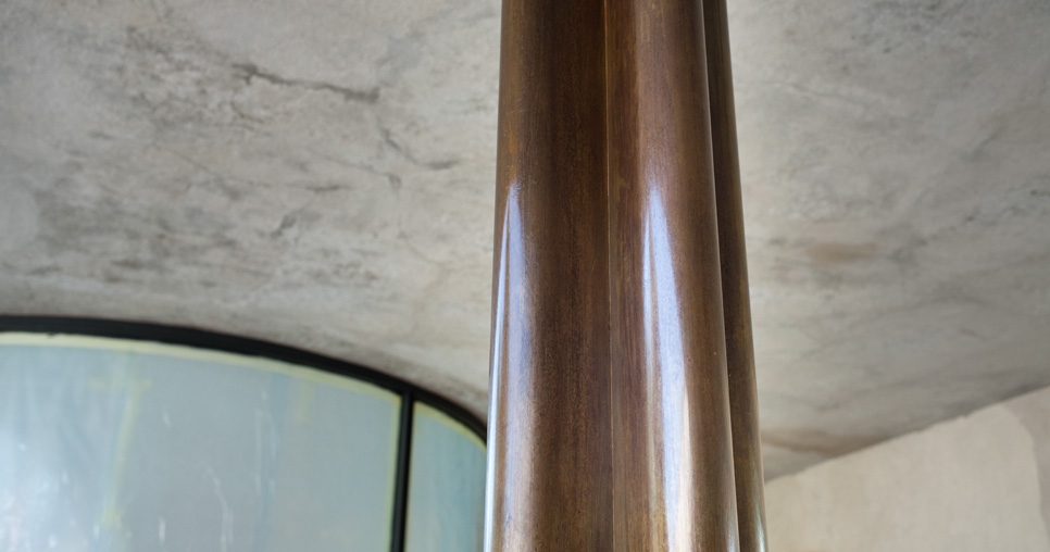 Restored cladding of the steel load-bearing columns on the entrance terrace, 2011, photograph: David Židlický