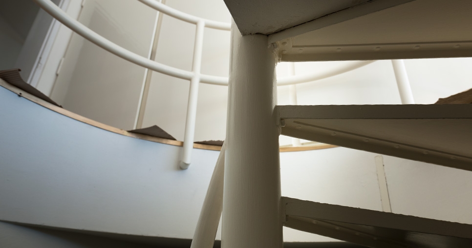 Steel spiral staircase leading from the 2nd floor to the technical floor (1st floor), 2011, photograph: David Židlický